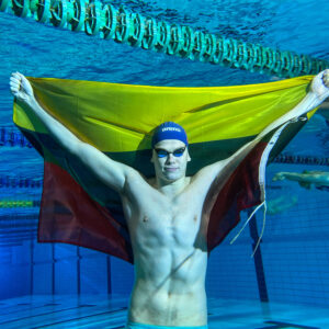 Danas Rapšys su Lietuvos trispalve